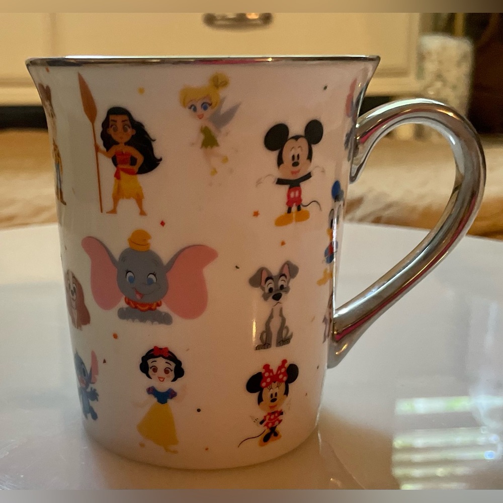 Disney D100 celebration gold handle mug with characters  NEW